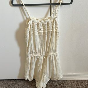 Cream romper from Rip curl size XS